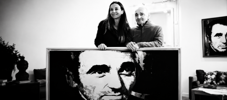 Valérie Durand presenting her contemporary artworks during an exhibition with Charles Aznavour.