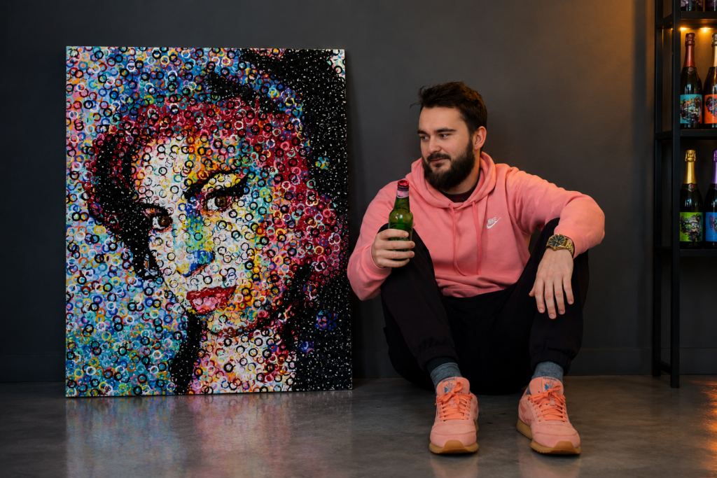 Bottl3man posing with an American singer during an exclusive contemporary art exhibition.