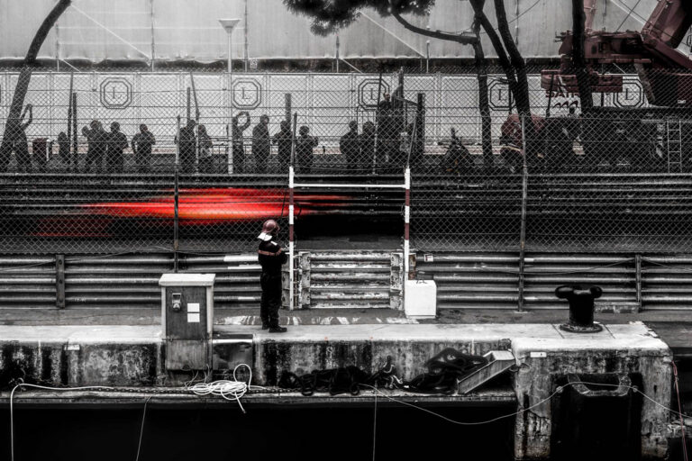 Fine art Ferrari photography capturing speed through the streets of Monaco by French photographer Laurent Leoncini.